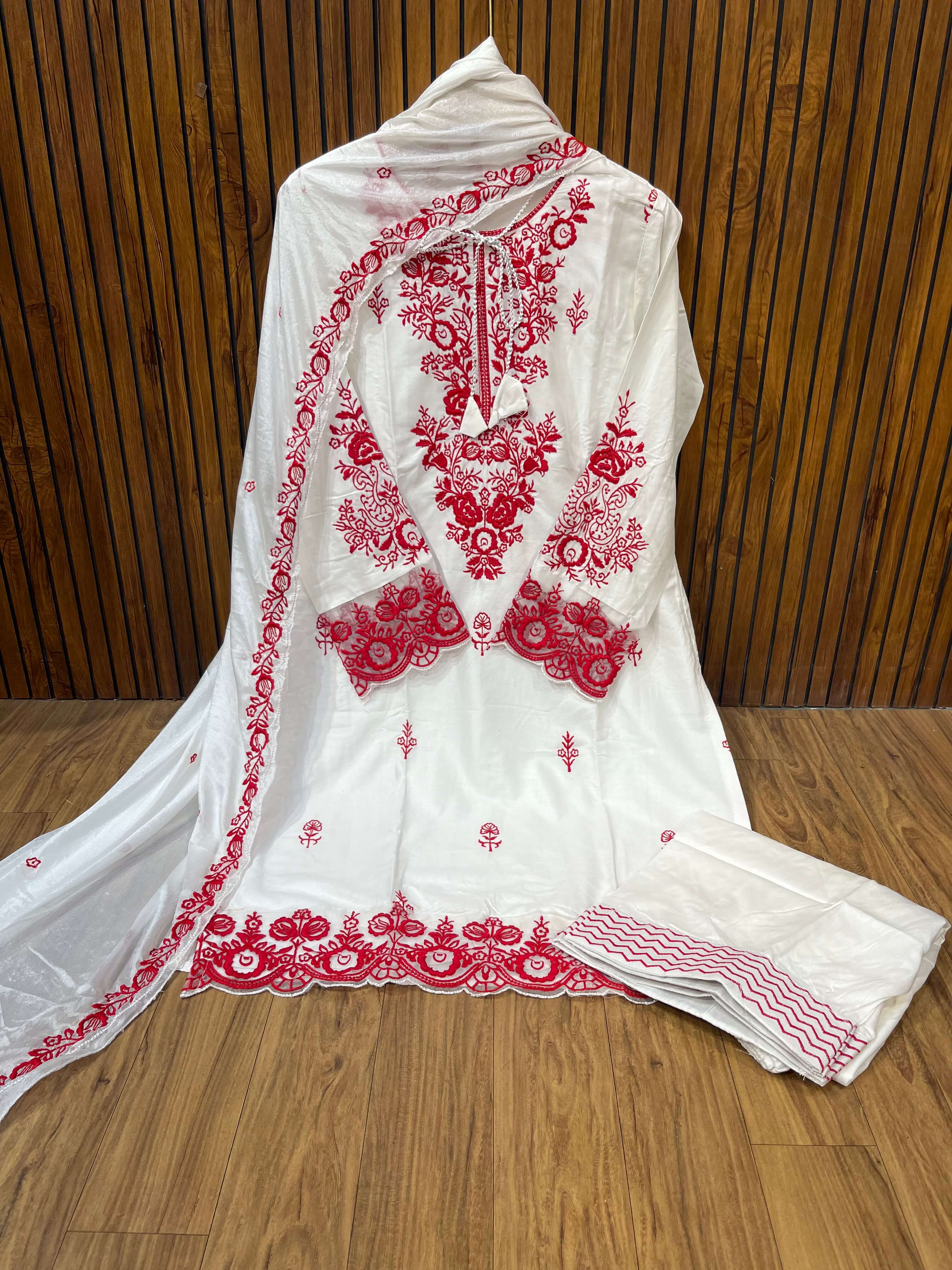 Elegant white rayon suit with heavy red floral embroidery work