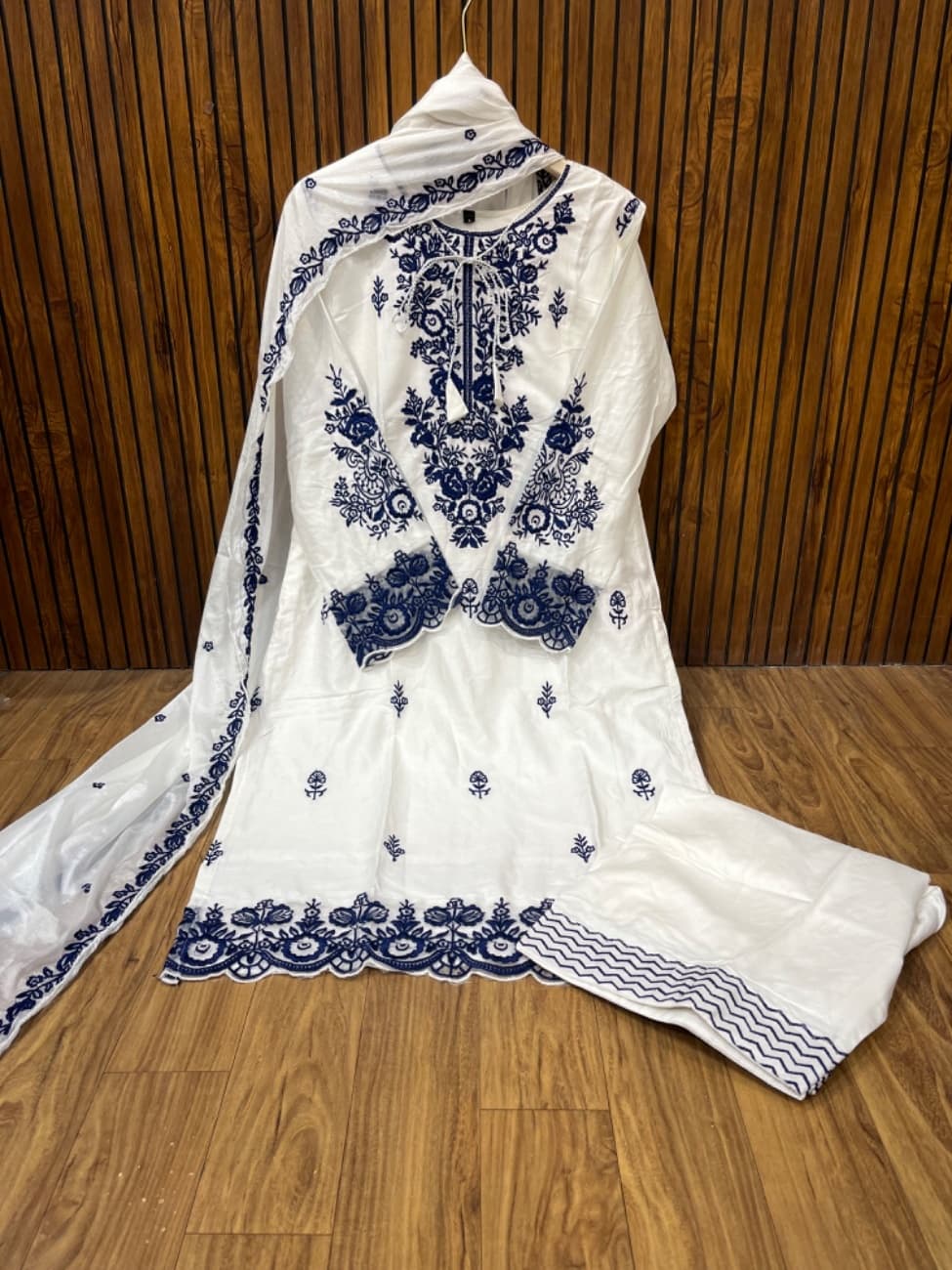Elegant white rayon suit with heavy blue  floral embroidery work