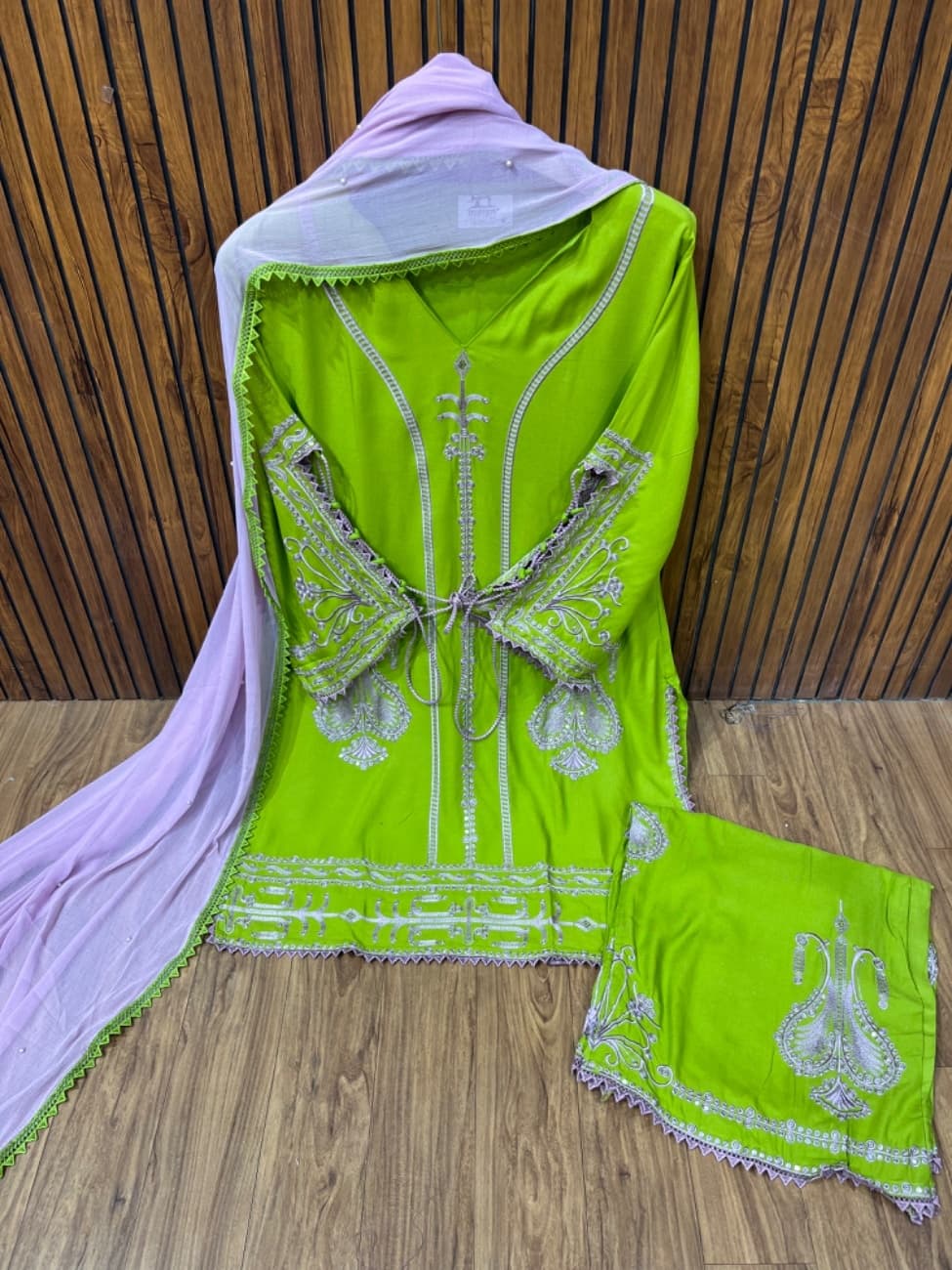 Neon lime green color paired beautifully with a soft pastel lavender dupatta