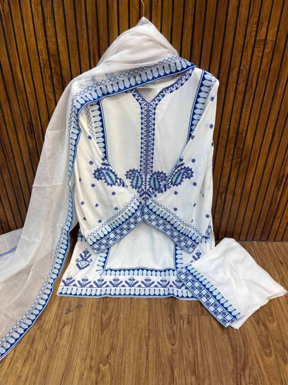 White royal blue thread embroidery work with a classy ethnic design.