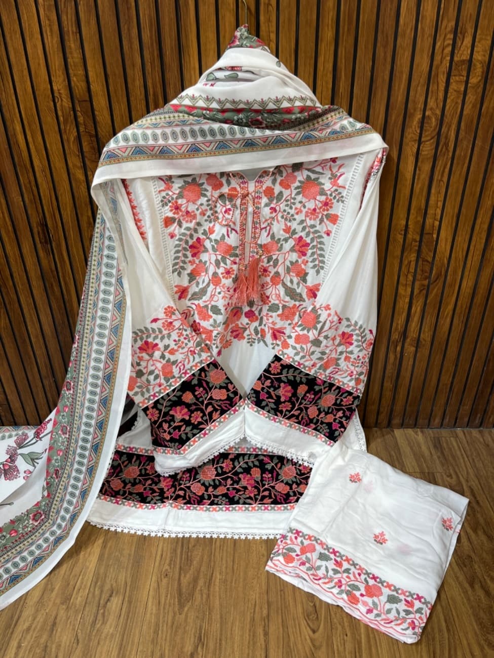 Elegant white rayon suit set featuring intricate Kashmiri embroidery work in vibrant floral patterns